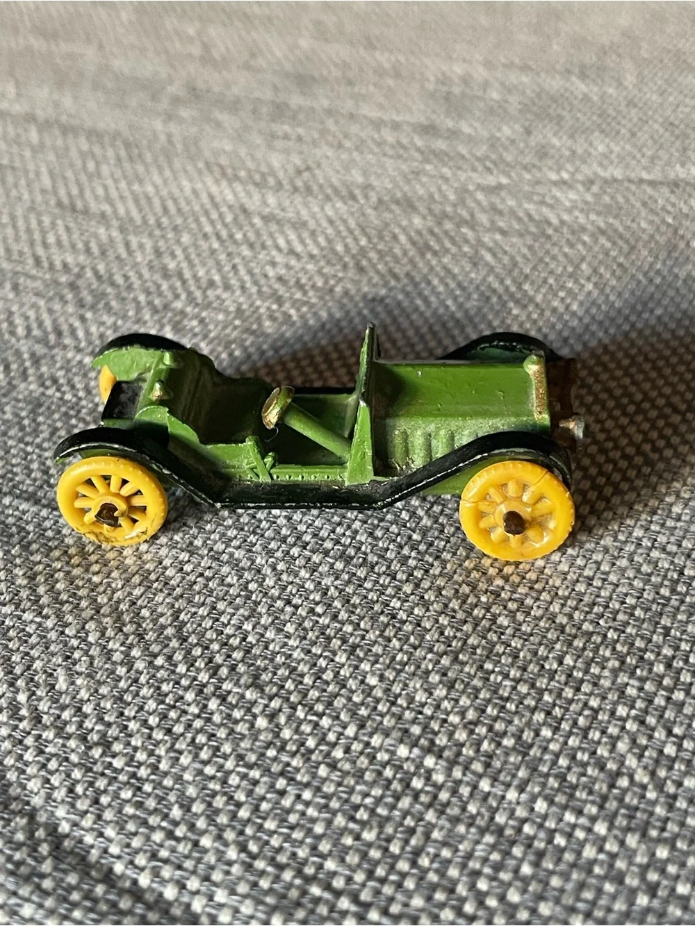 Vintage metal diecast car, made in England stamped on the bottom
